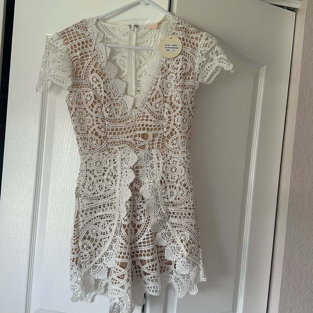 Never worn and NWT white lace romper